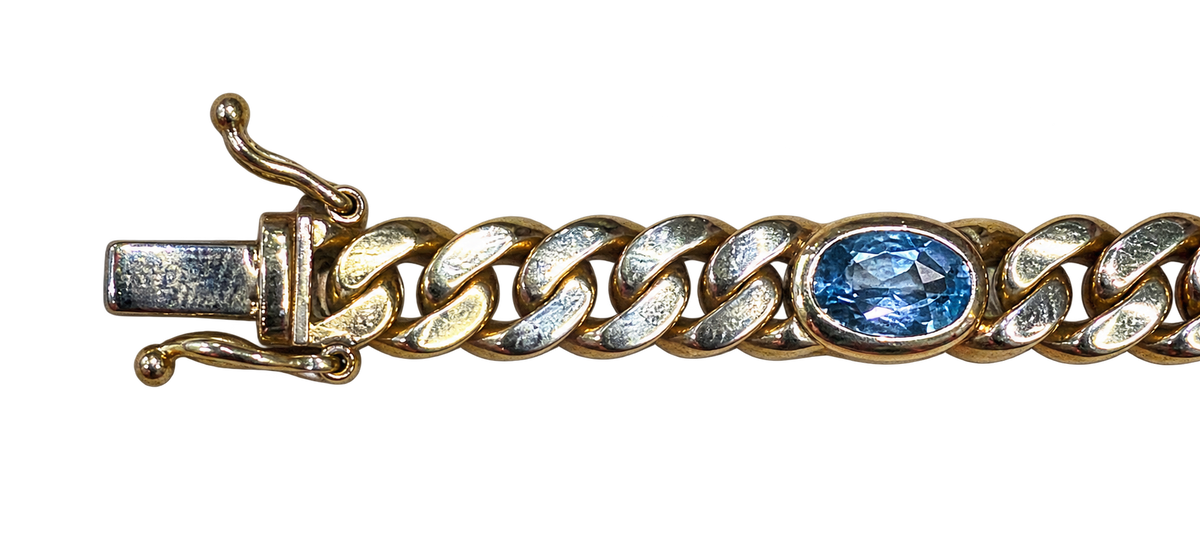 Panzerarmband in 585er Gold - Verschluss und blauer Topas im Detail